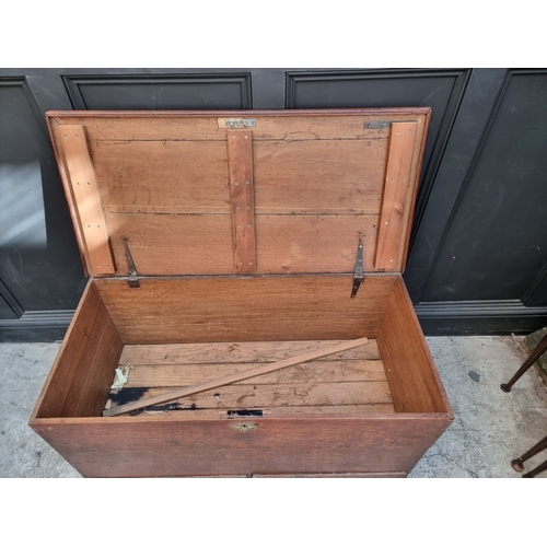 1034 - An 18th century oak mule chest, 109cm wide.