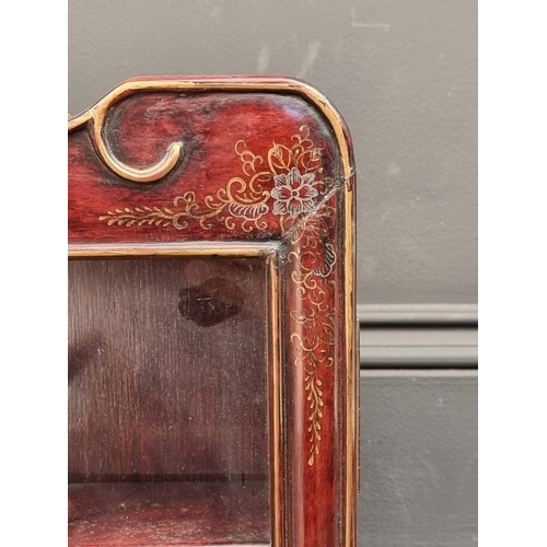 1037 - A small Chinese hardwood and parcel gilt hanging display cabinet, 63.5cm high x 48cm wide.... 