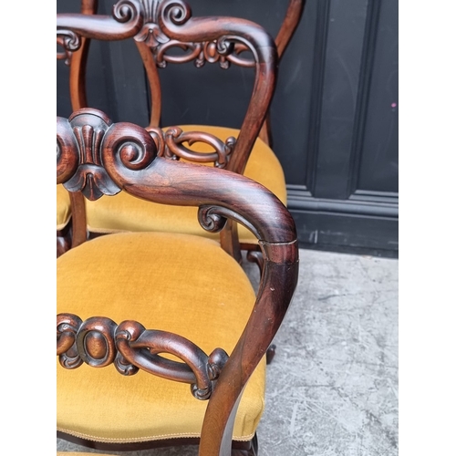 1065 - A good set of six Victorian rosewood dining chairs.