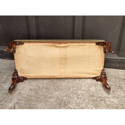 1069 - A Victorian carved rosewood and upholstered long stool, 110cm wide.