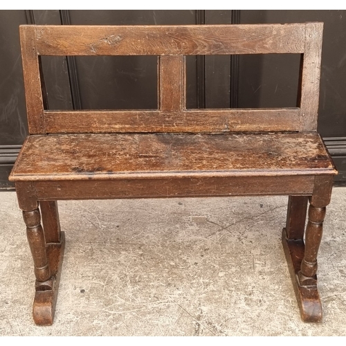 1070 - An 18th century and later oak hall bench, 91.5cm wide.