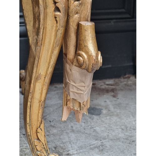 1072 - A Louis XV style carved giltwood and upholstered salon suite, comprising: a settee, 132cm wide; a pa... 