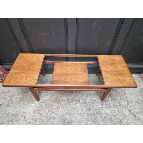 1074 - A mid-century G-Plan 'Fresco' teak coffee table, 137cm wide.As featured in Don Draper's office in th... 