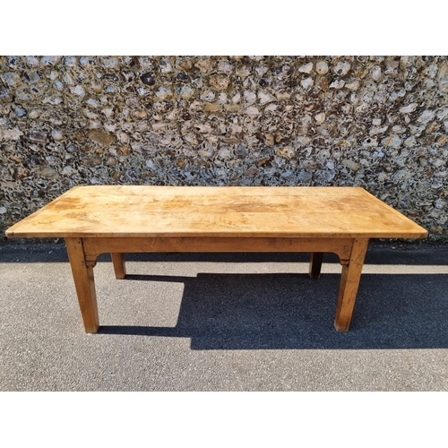 1076 - An old chestnut refectory table, probably French, with a three plank cleated end top above dummy fri... 