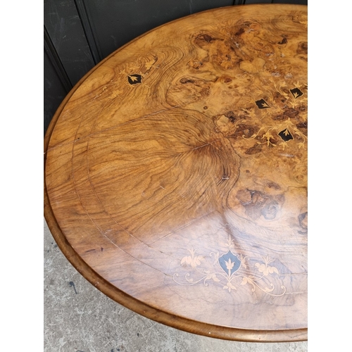1082 - A Victorian figured walnut and inlaid oval tilt-top loo table, 118cm wide.