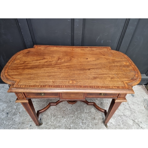 1083 - A late Victorian mahogany, satinwood crossbanded and inlaid centre table, with a frieze drawer and o... 
