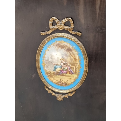 1084 - A Victorian ebonized, burr yew and inlaid credenza, incorporating a Sevres style porcelain panel and... 