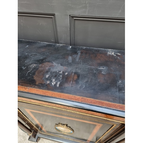 1084 - A Victorian ebonized, burr yew and inlaid credenza, incorporating a Sevres style porcelain panel and... 
