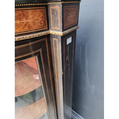 1084 - A Victorian ebonized, burr yew and inlaid credenza, incorporating a Sevres style porcelain panel and... 