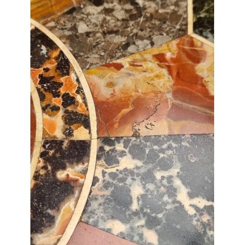 1087 - A Victorian walnut and specimen marble tripod occasional table, 67cm diameter.