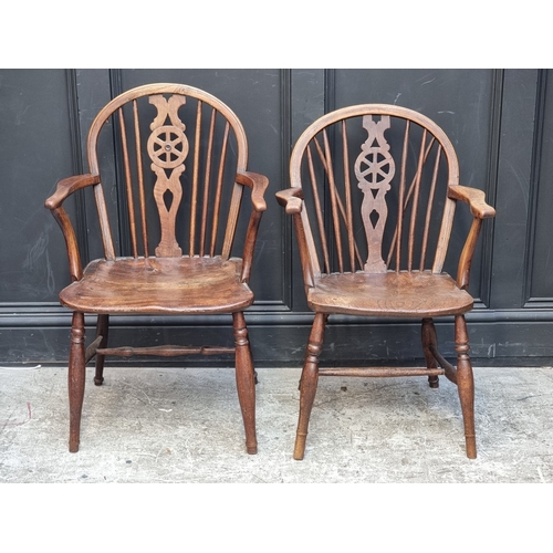 1096 - A 19th century ash, elm and beech stickback Windsor armchair; together with two similar wheelback ex... 