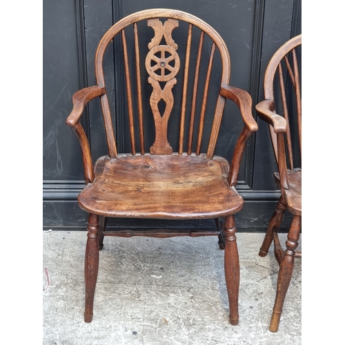 1096 - A 19th century ash, elm and beech stickback Windsor armchair; together with two similar wheelback ex... 