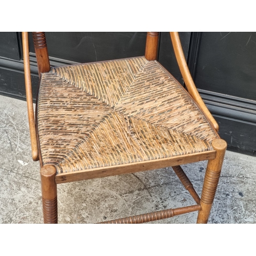 1097 - An unusual late Victorian turned mahogany, walnut and rush seated side chair.