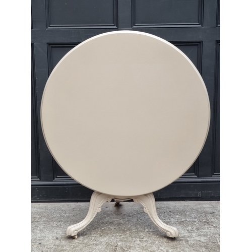 1105 - A pale grey painted Victorian circular tilt-top breakfast table, 101cm diameter.