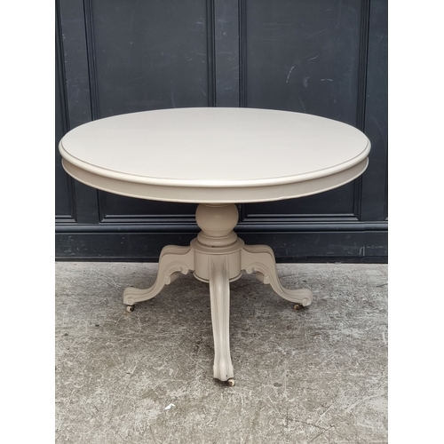 1105 - A pale grey painted Victorian circular tilt-top breakfast table, 101cm diameter.