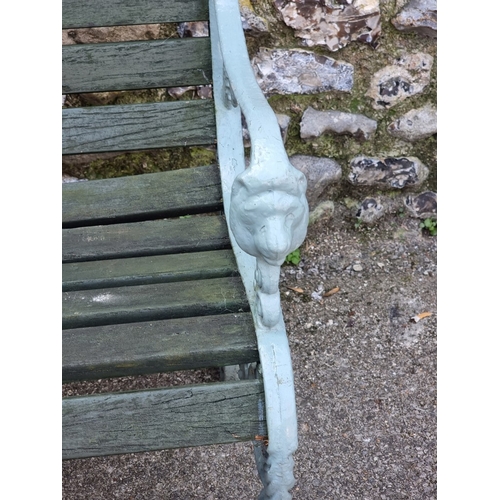 1115 - A green painted aluminium garden bench, 124.5cm wide; together with a large green stained folding ga... 