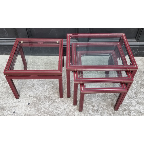1118 - A nest of three Pierre Vandel occasional tables, each with bevelled glass inset, (smallest chipped),... 