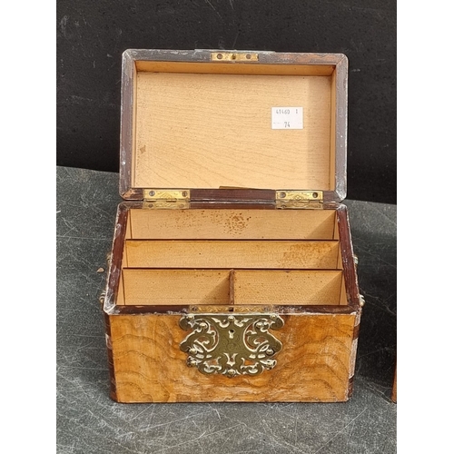 1125 - Three Victorian walnut and brass strapwork caskets, the largest with ivory mounts, 23.5cm wide. (3) ... 