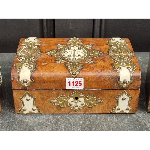1125 - Three Victorian walnut and brass strapwork caskets, the largest with ivory mounts, 23.5cm wide. (3) ... 