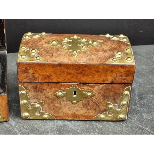 1125 - Three Victorian walnut and brass strapwork caskets, the largest with ivory mounts, 23.5cm wide. (3) ... 