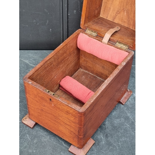 1147 - A small teak cellarette, 32.5cm high x 25cm wide x 34cm deep.