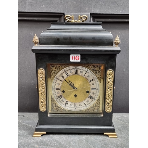1182 - An 18th century style ebonized mantel clock, 41cm high, with battery movement.