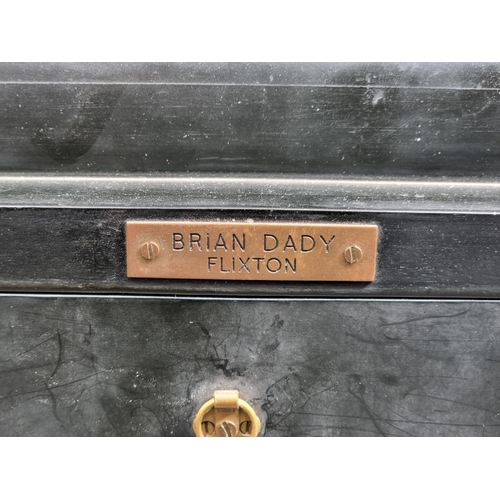 1182 - An 18th century style ebonized mantel clock, 41cm high, with battery movement.