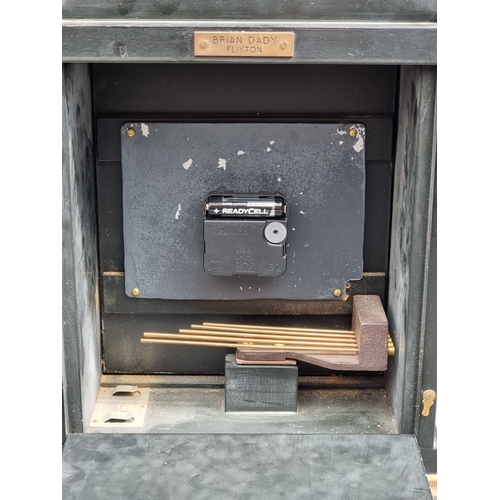 1182 - An 18th century style ebonized mantel clock, 41cm high, with battery movement.