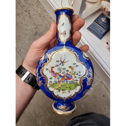 1284 - A mixed group of English and Continental ceramics, largest 28.5cm high. (9)