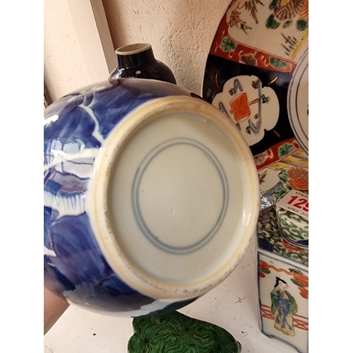 1293 - A mixed group of Chinese and Japanese ceramics, 18th century and later, to include a miniature Cizho... 