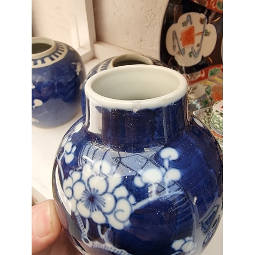 1293 - A mixed group of Chinese and Japanese ceramics, 18th century and later, to include a miniature Cizho... 