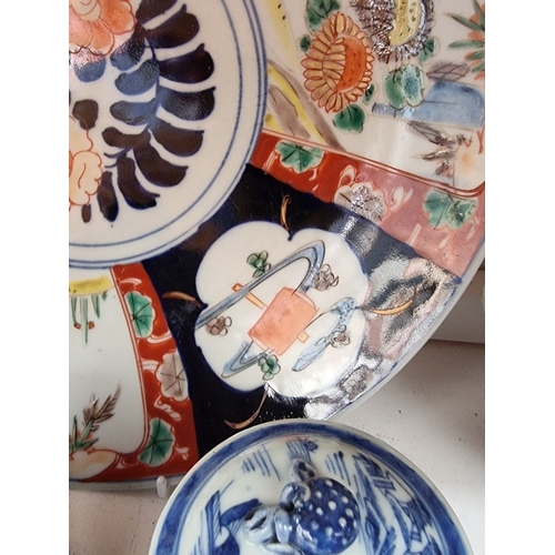 1293 - A mixed group of Chinese and Japanese ceramics, 18th century and later, to include a miniature Cizho... 