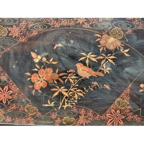 1297 - A large Japanese lacquer tray, 72cm wide.