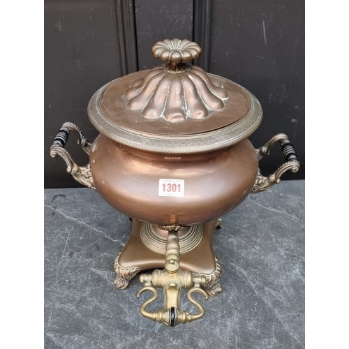 1301 - A 19th century copper samovar, with brass tap, 36cm high.