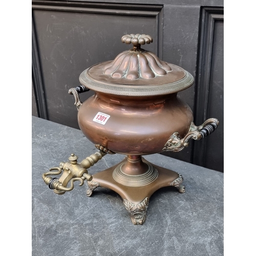 1301 - A 19th century copper samovar, with brass tap, 36cm high.