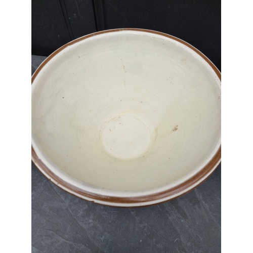 1303 - A large glazed terracotta dairy bowl, 23cm high x 48cm diameter.