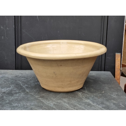 1304 - A graduated pair of dairy bowls, largest 26cm high x 50cm diameter. (2)