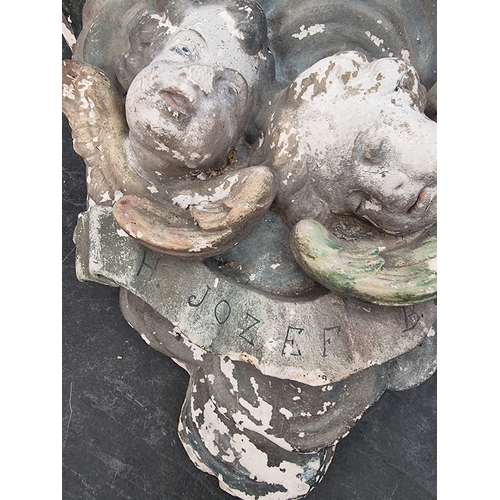 1308 - A large painted plaster cherub wall bracket, 44 x 48.5cm, (s.d.).
