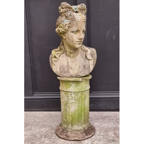 1311 - A life-sized composition stone female bust, on associated pedestal, 102.5cm high.