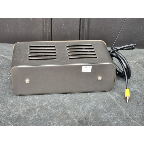 1319 - Hi-Fi: a Quad '303' power amplifier; together with a Quad '33' pre-amplifier, with instruction bookl... 