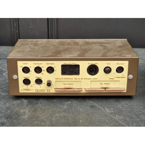 1319 - Hi-Fi: a Quad '303' power amplifier; together with a Quad '33' pre-amplifier, with instruction bookl... 