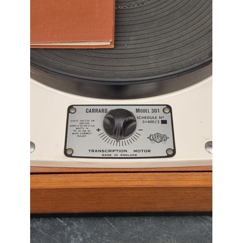 1321 - Hi-Fi: a Garrard 'Model 301' transcription turntable, with SME pick-up arm, boxed, and Shure 'Supert... 