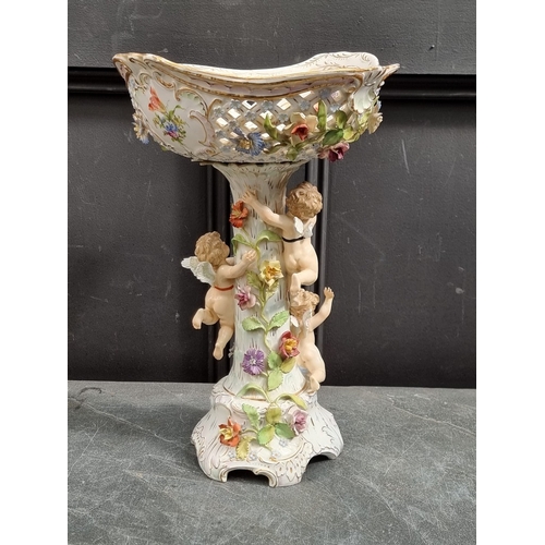 1329 - A Carl Thieme porcelain centrepiece, 42cm high (small chips).