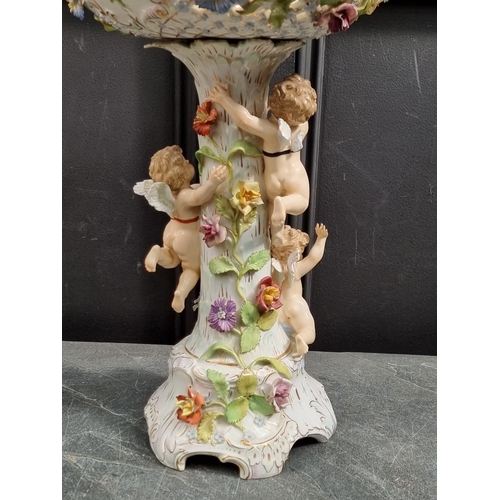 1329 - A Carl Thieme porcelain centrepiece, 42cm high (small chips).