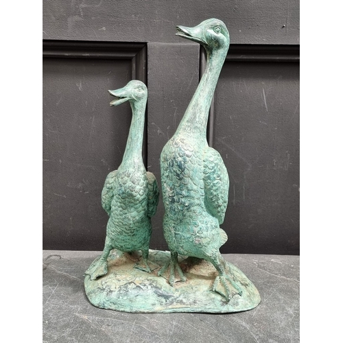 1330 - Two verdigris bronze duck water features, 43.5cm high.