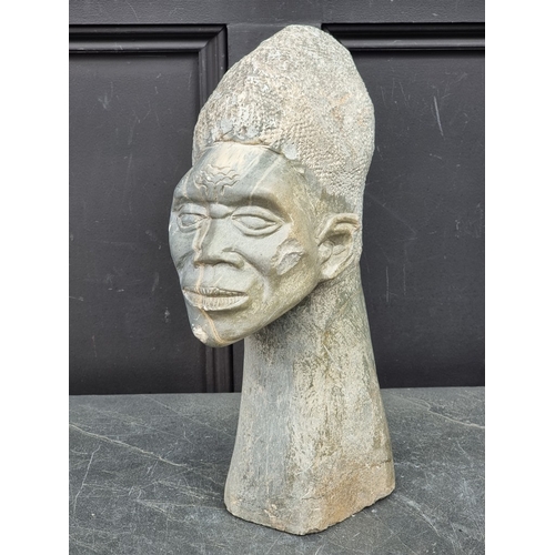 1331 - Ethnographica: a large soapstone bust, 42cm high, (chips).