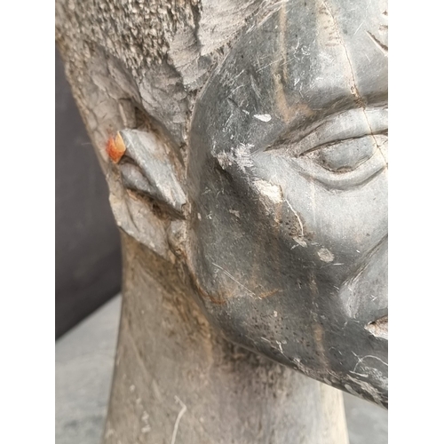 1331 - Ethnographica: a large soapstone bust, 42cm high, (chips).