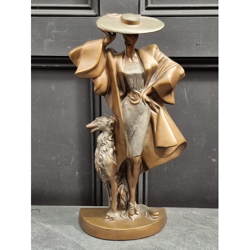 1332 - An Art Deco style durastone figure, by Austin, 49cm high.
