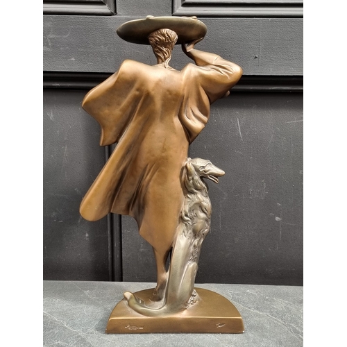 1332 - An Art Deco style durastone figure, by Austin, 49cm high.