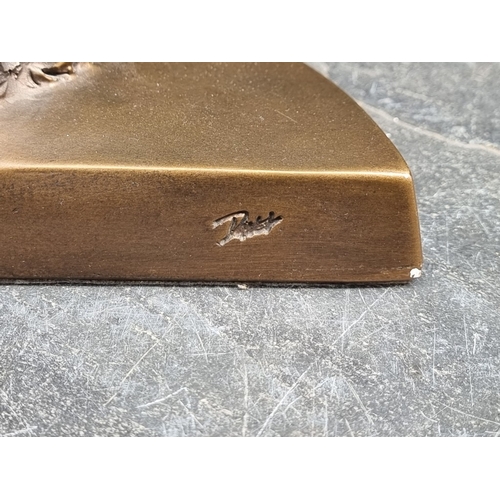 1332 - An Art Deco style durastone figure, by Austin, 49cm high.